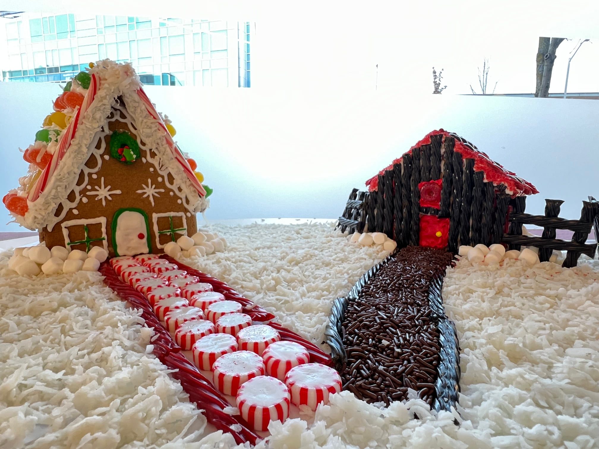 Two gingerbread houses: one bright and cheery, the other dark and gloomy