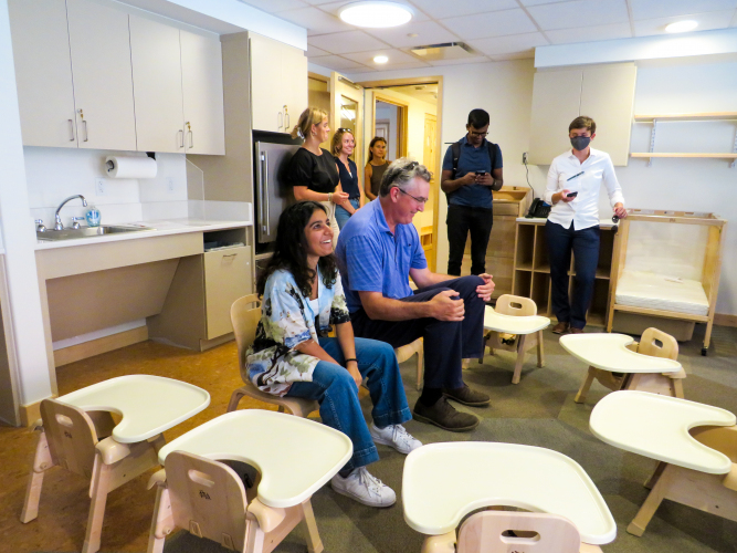 Pragnya Kousik and Tom Fanning try out toddler chairs