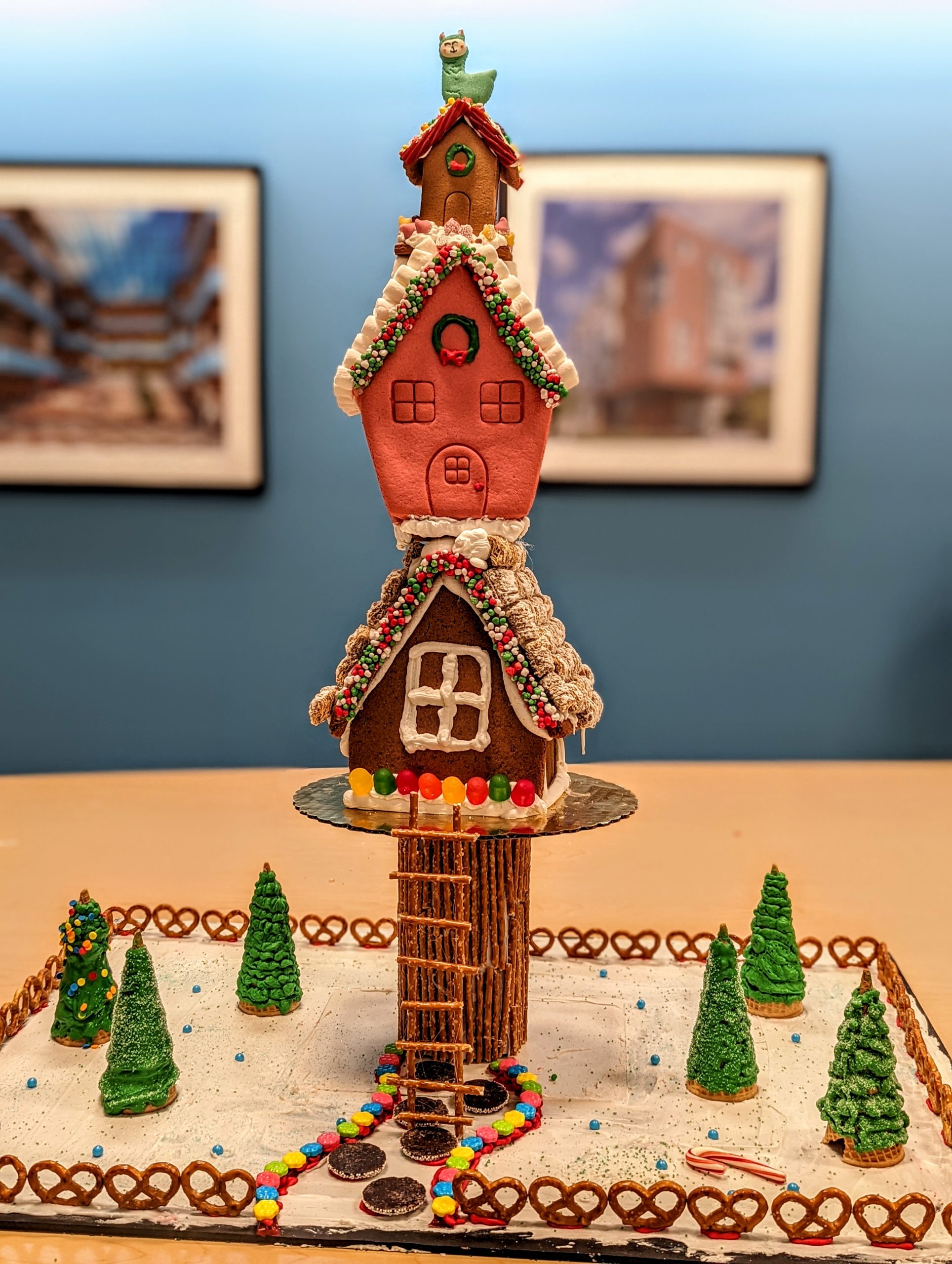 Three gingerbread houses stacked on top of eachother